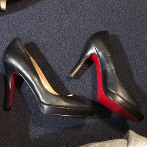 Oh..deer! Black heel pumps size 7 red bottoms